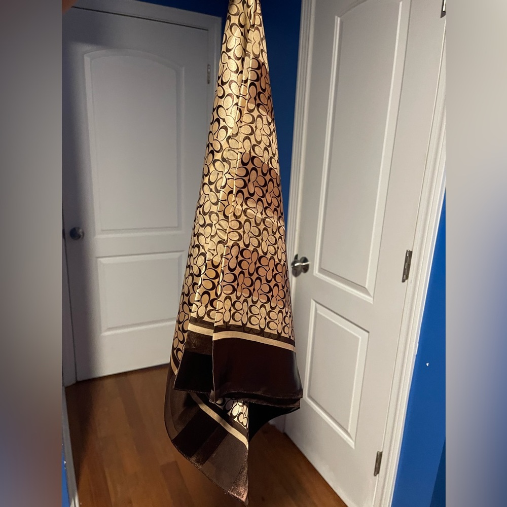 Coach accessories/ Coach scarf. 37L X 38.50W